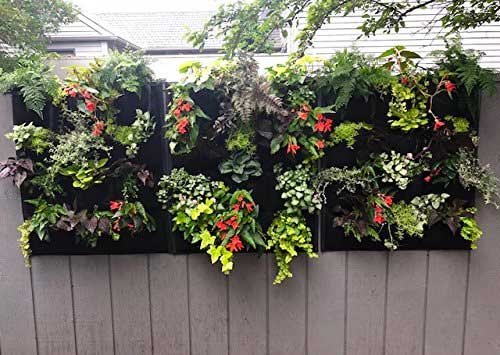Lightweight 12 Pocket Hanging Planters on a Fence