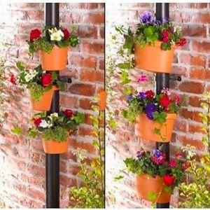 Adjustable Downspout Planters to to Hide Downspouts and Grow Plants Vertically